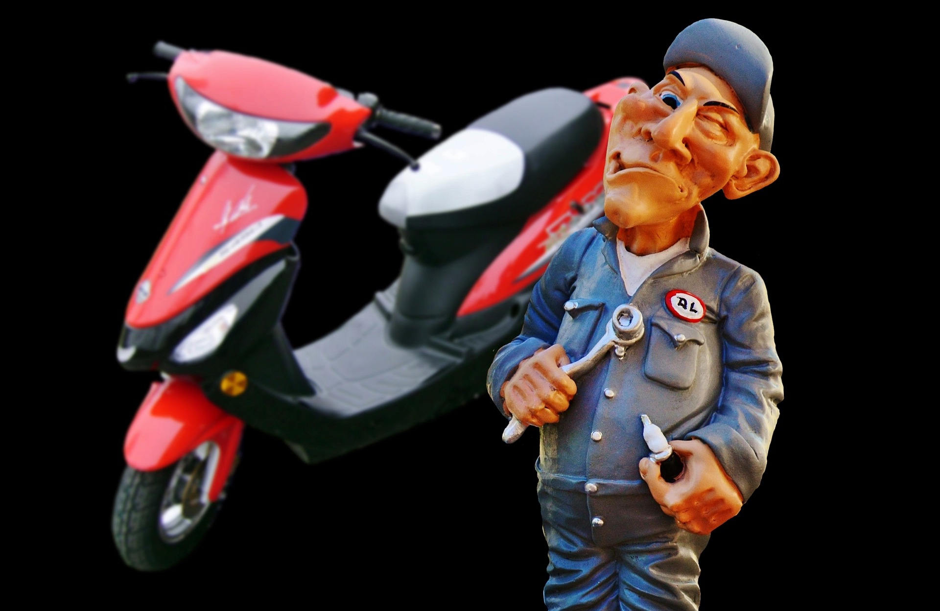 Der Schraubermeister vor einem Moped